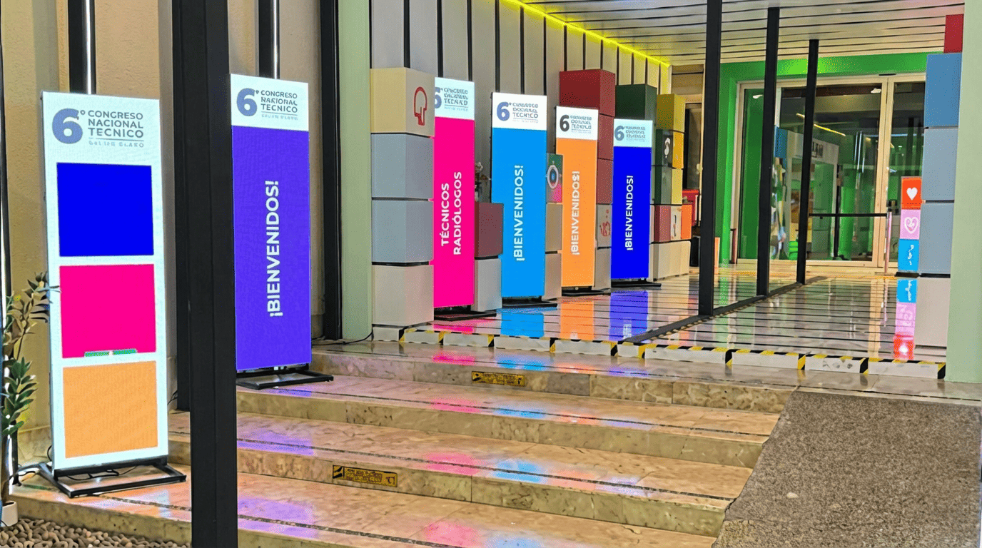 Vertical LED signage welcoming visitors at conference venue