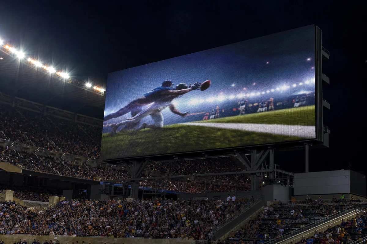 Large LED video scoreboard operating in a professional sports stadium